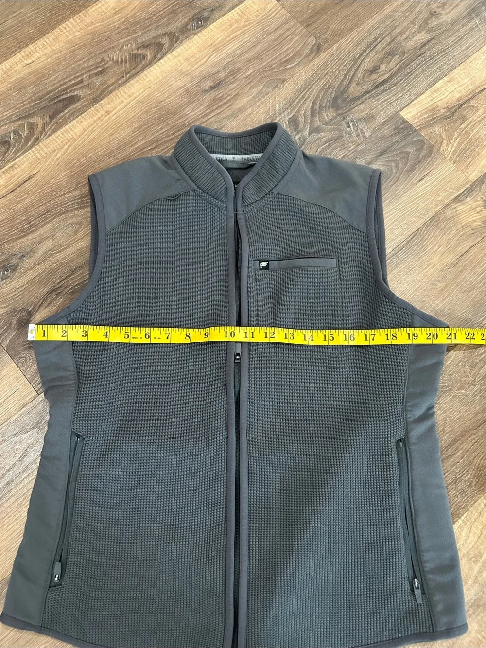 Fabletics men’s gray vest feel good performance, large zip pockets